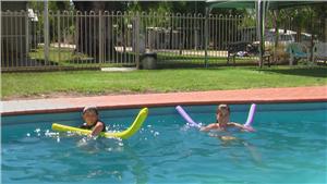 Having fun in the pool.